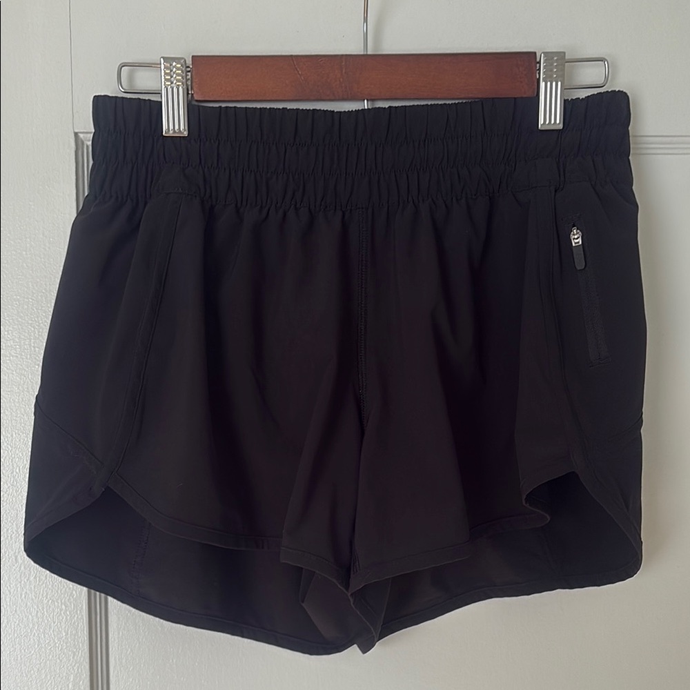 Lululemon Athletica Black Athletic Shorts Tracker V, 4 inch length, Size 10